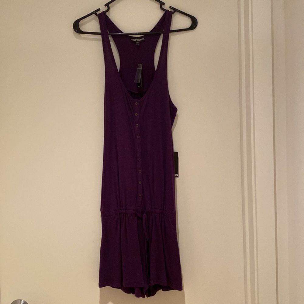 Purple Express romper. Size S. NWT